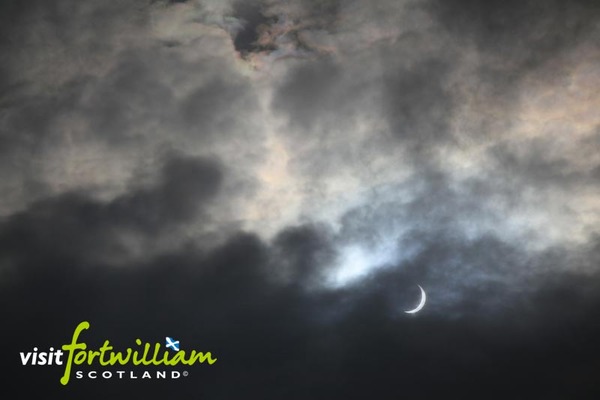 Large solar eclipse above ben nevis