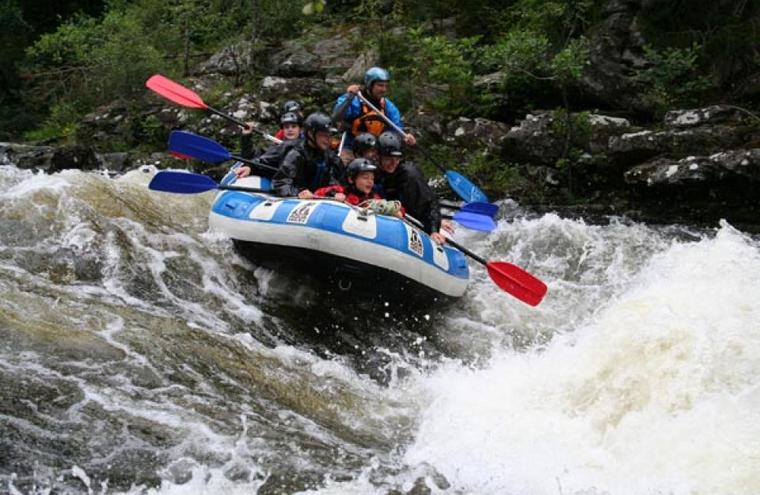 Medium large white water rafting river garry